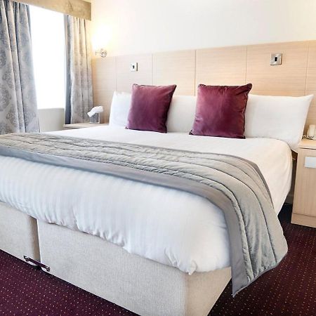 Cambridge Hotel Waterfront Брайтхаус Экстерьер фото