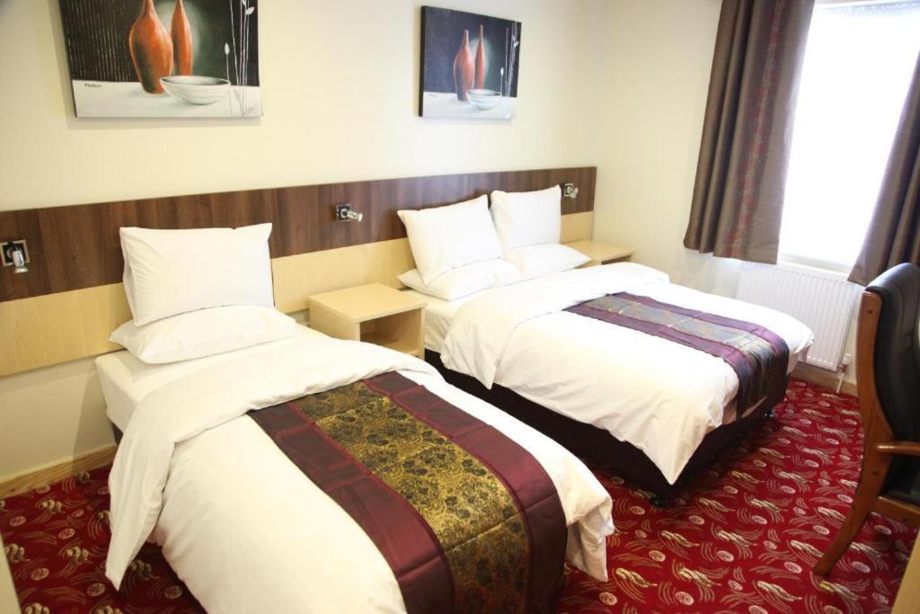 Cambridge Hotel Waterfront Брайтхаус Экстерьер фото