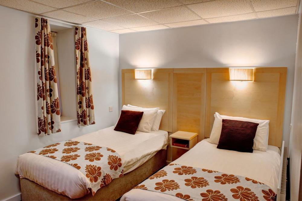 Cambridge Hotel Waterfront Брайтхаус Экстерьер фото