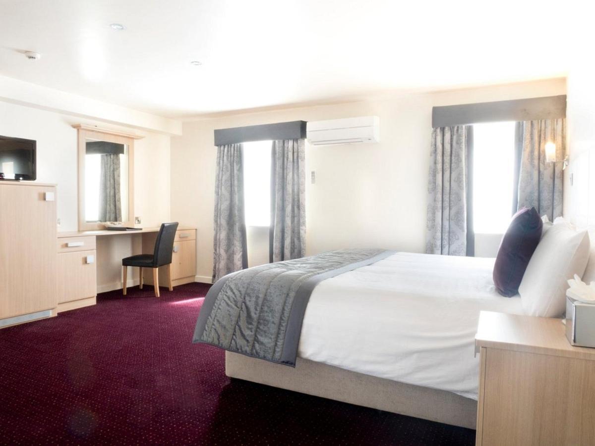 Cambridge Hotel Waterfront Брайтхаус Экстерьер фото